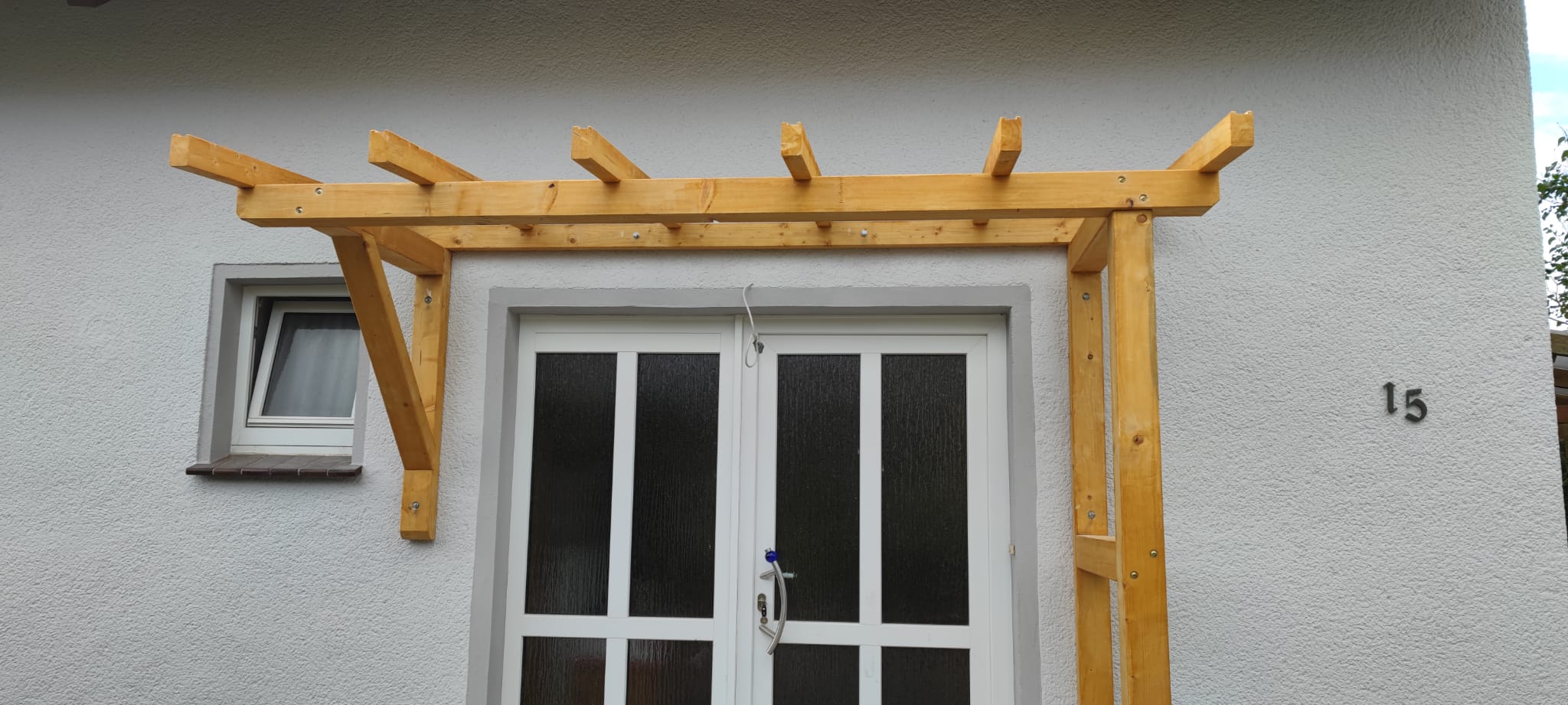 KVH-Holz mit SG-Sicherheitsglas Haustürüberdachung Vorne